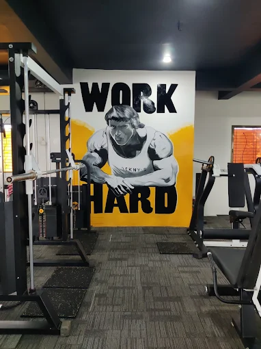 best gym in Wardha - Muscle Gym power racks and heavy dumbbells